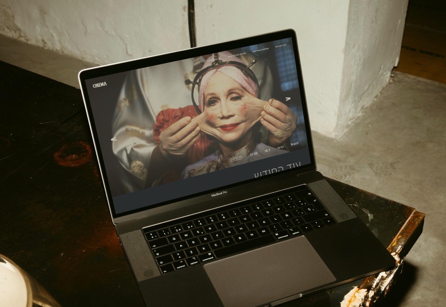 The CINEMA website on a laptop