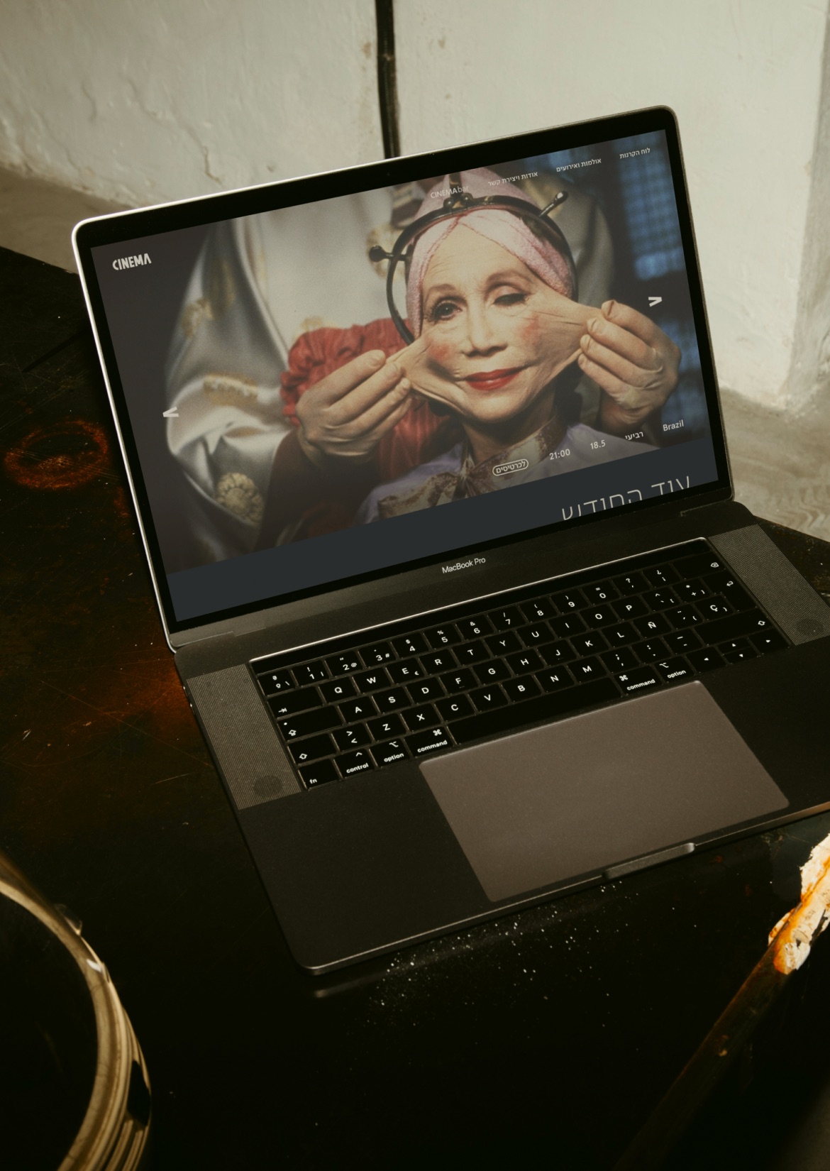 The CINEMA website on a laptop