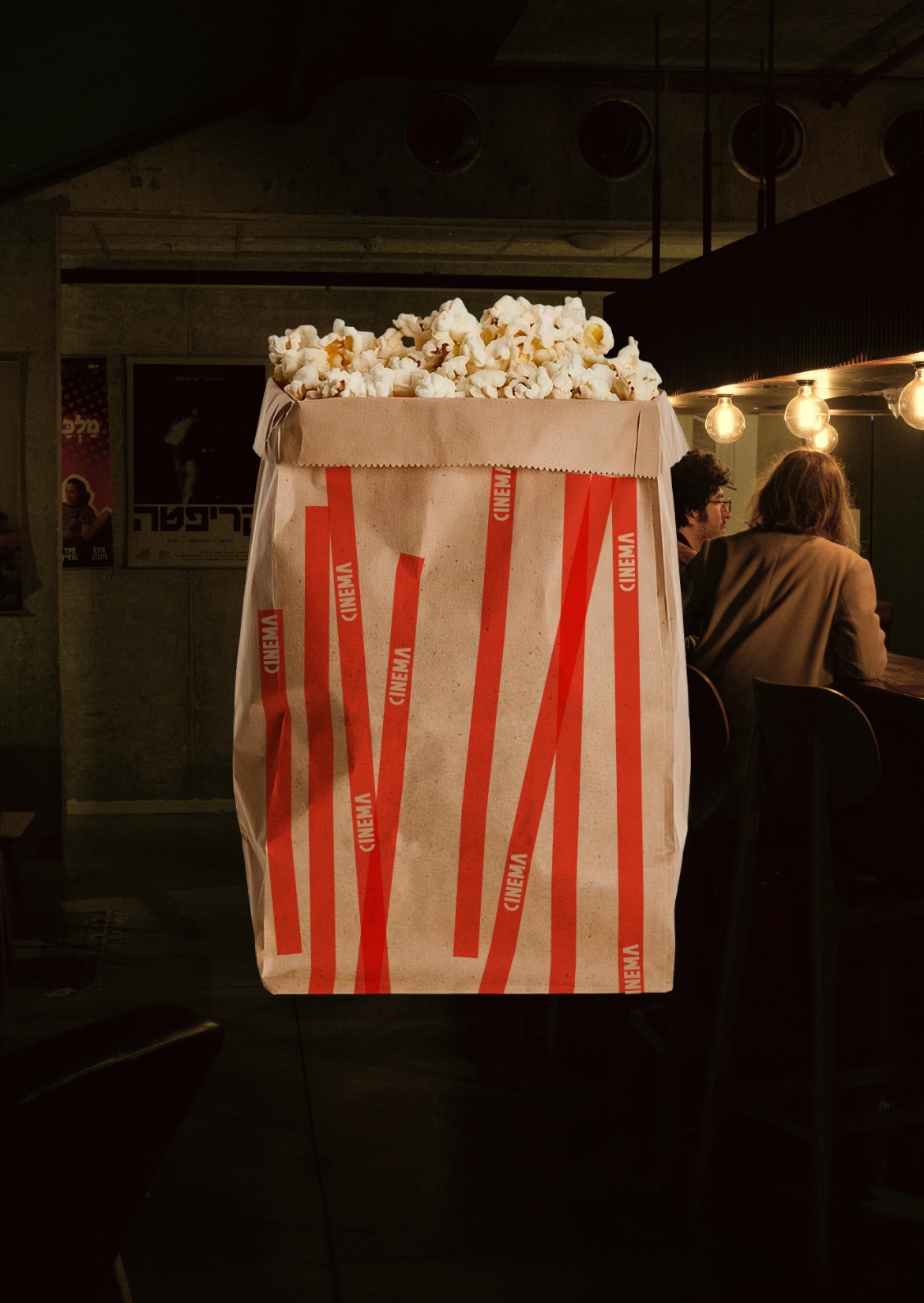 CINEMA popcorn bag at the cinema bar